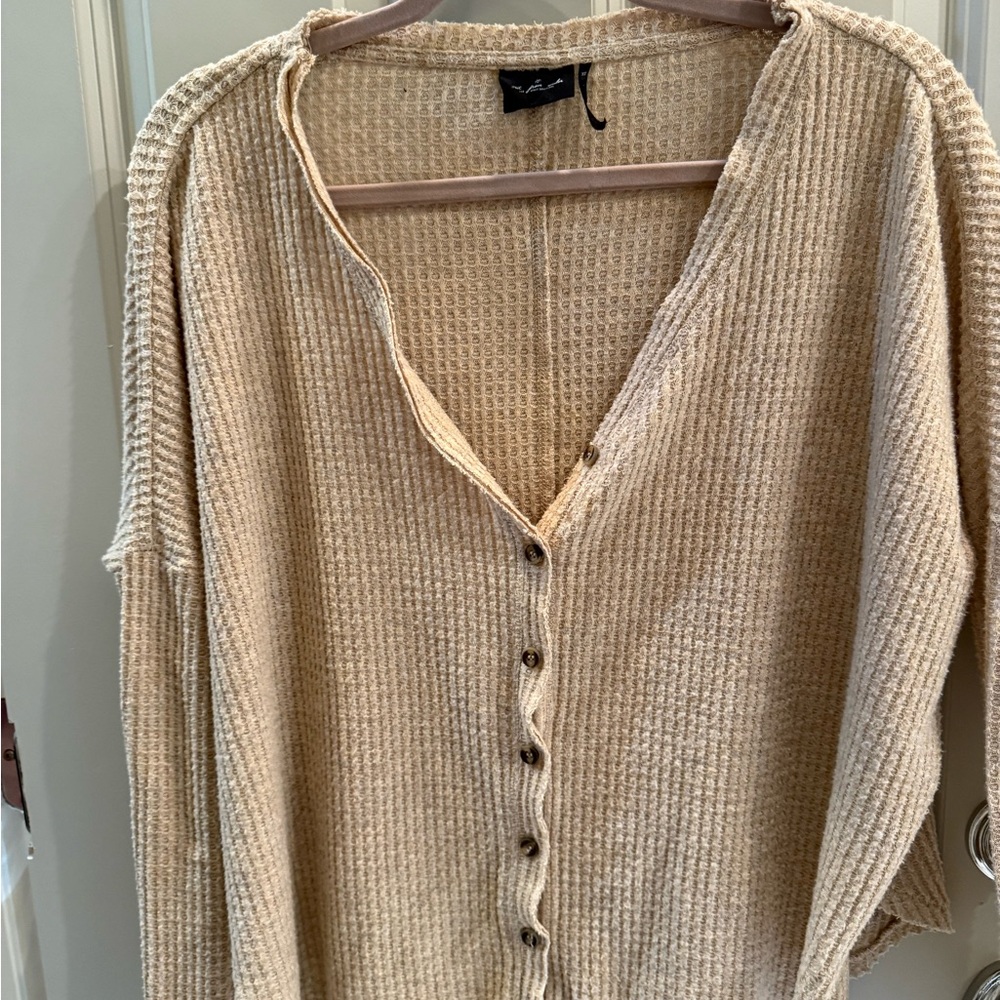 Free people cardigan  tie at bottom. Lightweight and in excellent condition